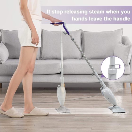 Man Cleaning Floor with Vacuum Cleaner
