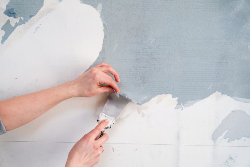 Removing Wallpaper Using Spatula