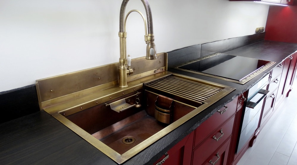 Copper double sink in the kitchen interior