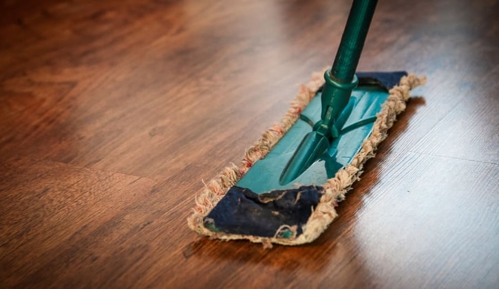 Dark Green Mop on Laminated Wooden Floor